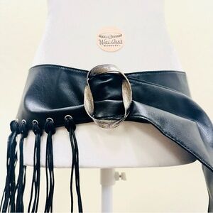 Black leather belt with silver buckle and fringe details